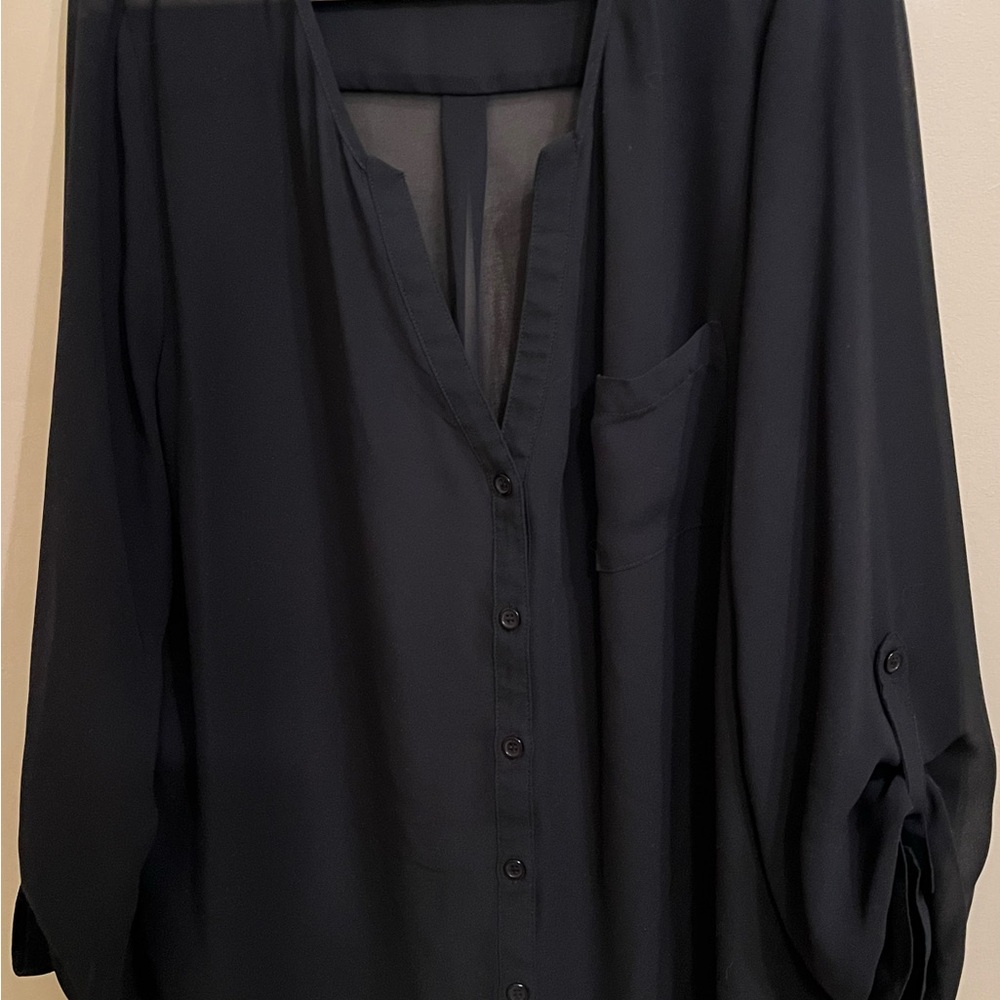 Black XLarge top, (label doesn’t have brand & I can’t remember what it is)
